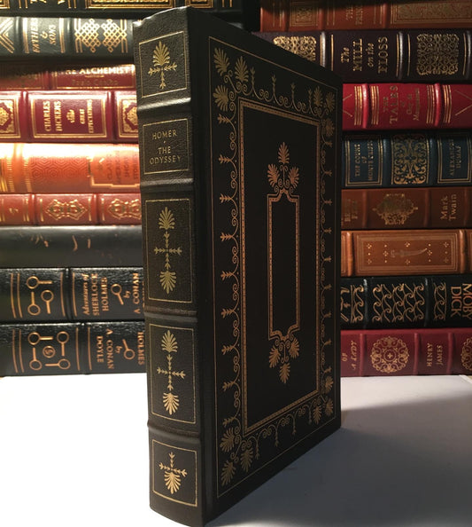 Leather-bound edition of Homer's The Odyssey published by The Franklin Library, featuring gilded edges and silk moiré endpapers